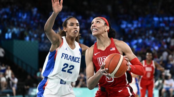 Purple, White and Whew! U.S. survive France scare, win eighth Olympic gold