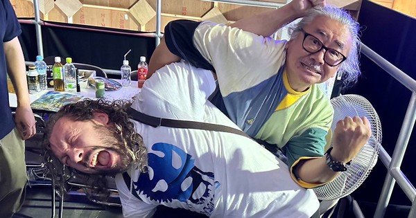 Last Fantasy Composer Nobuo Uematsu Places AEW Wrestler Kenny Omega in Cobra Twist at Tokyo Recreation Present