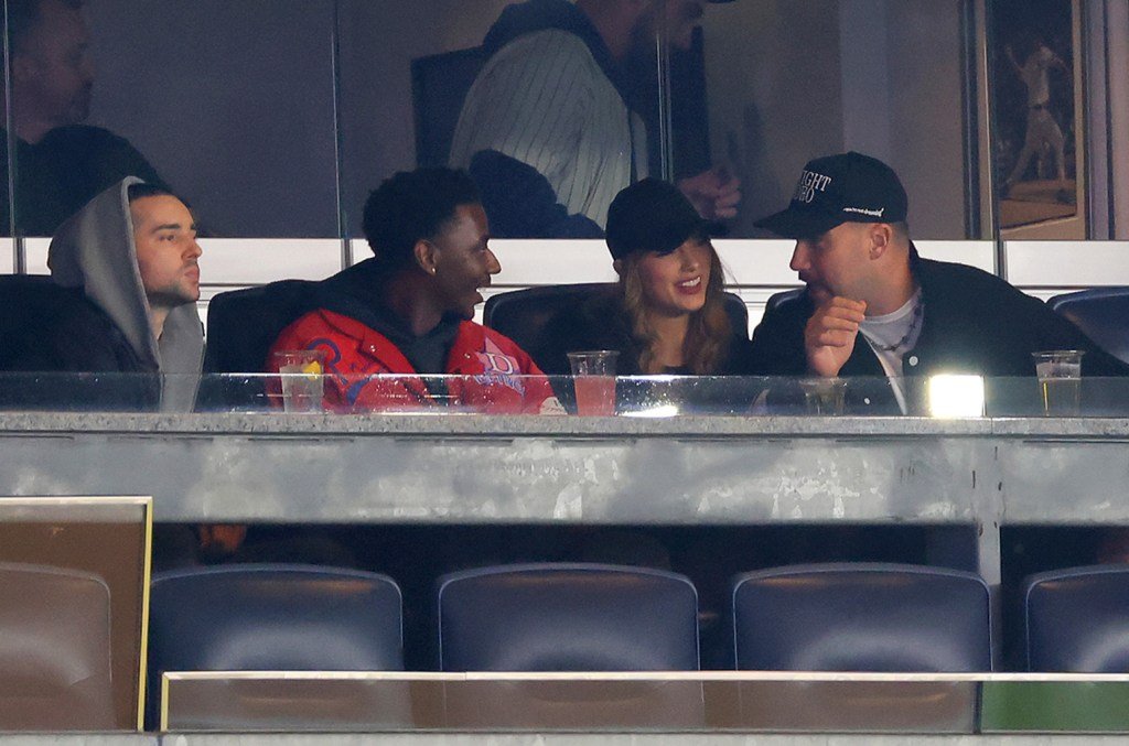 Taylor Swift & Travis Kelce Rock Black Baseball Caps to Recreation 1 Between the New York Yankees & Cleveland Guardians