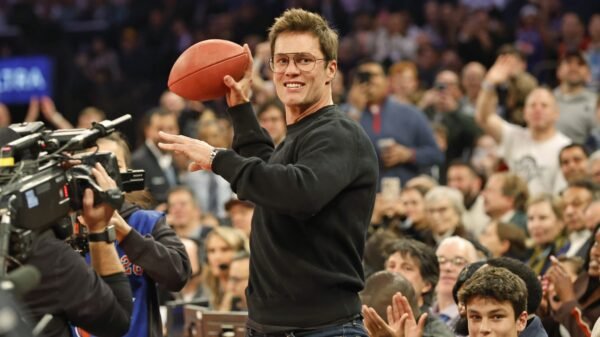 Tom Brady booed loudly, chucks signed soccer into crowd whereas courtside at Knicks-Nets