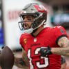 Watch: Buccaneers let WR Mike Evans tie Corridor of Famer’s file