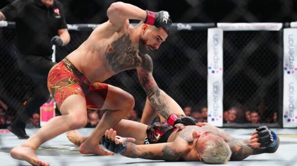 Watch Ilia Topuria flatline Charles Oliveira to win UFC lightweight gold