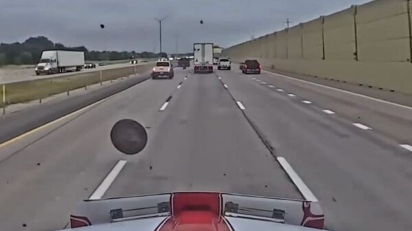 NASCAR hauler hits runaway wheel, releases dash cam footage of traffic incident