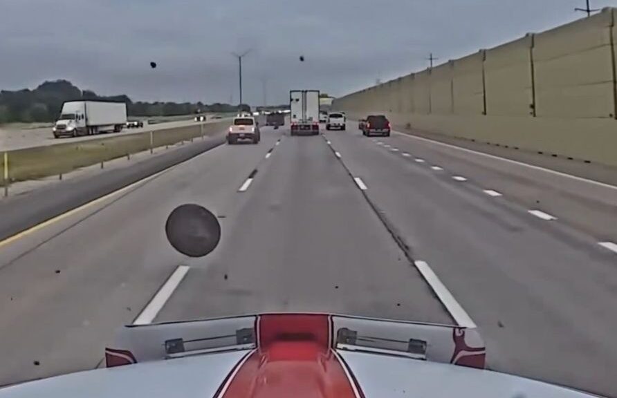 NASCAR hauler hits runaway wheel, releases dash cam footage of traffic incident