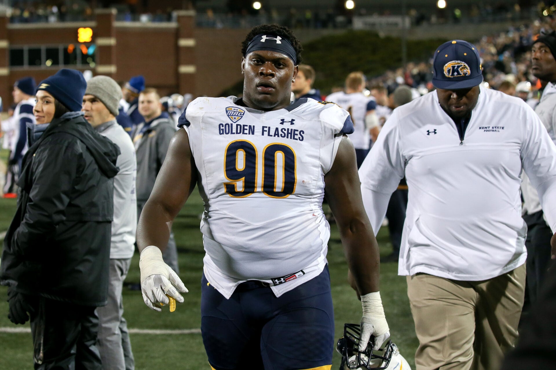 Ex-NFL star who squatted 700lbs lands devastating 11-second KO to become an MMA champion