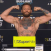 Conor McGregor bigger than ever as he weighs in for Max Holloway rematch at UFC 329