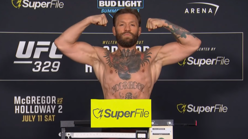 Conor McGregor bigger than ever as he weighs in for Max Holloway rematch at UFC 329