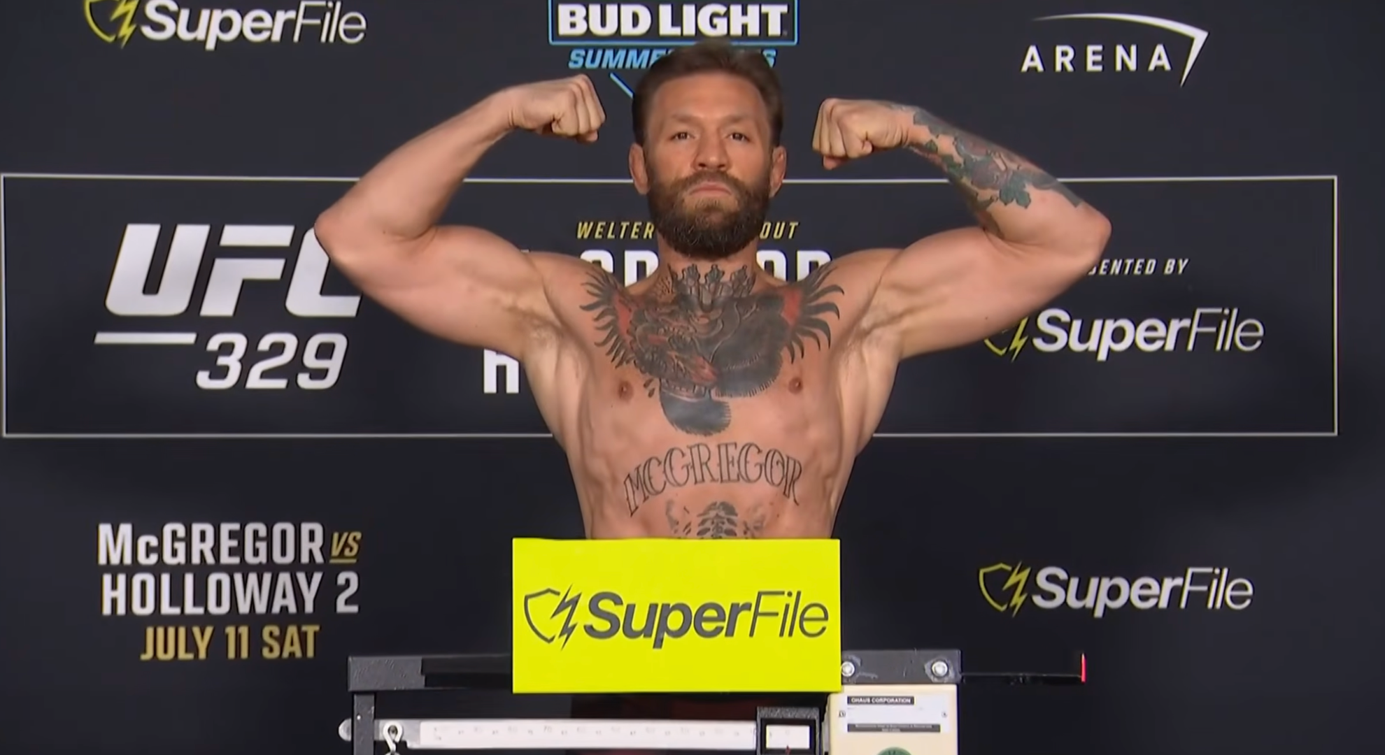 Conor McGregor bigger than ever as he weighs in for Max Holloway rematch at UFC 329