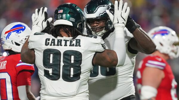 Jalen Carter’s teammates celebrate his new contract