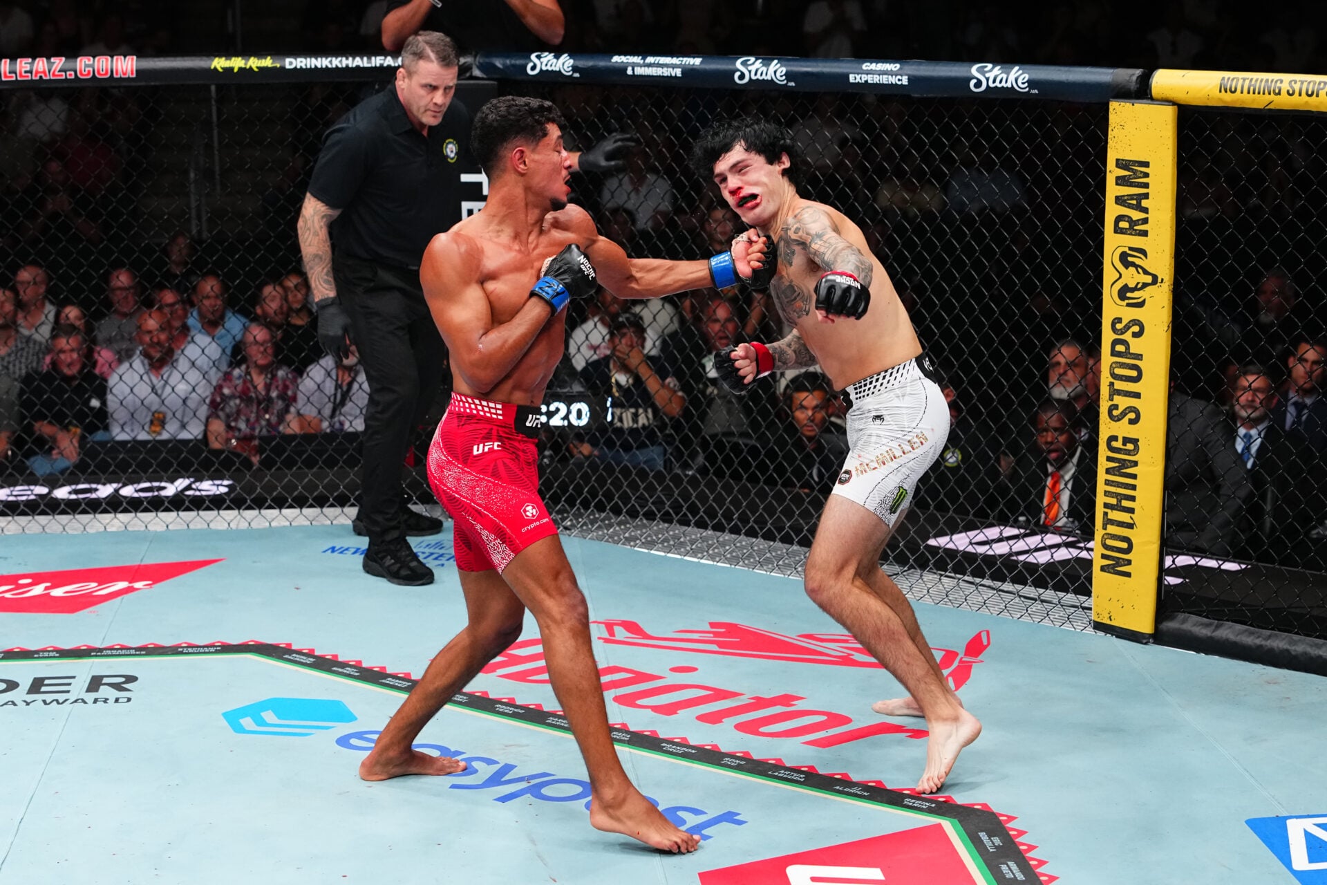 Tommy McMillen survives heavy knockdown to win Fight of the Year contender at Noche UFC